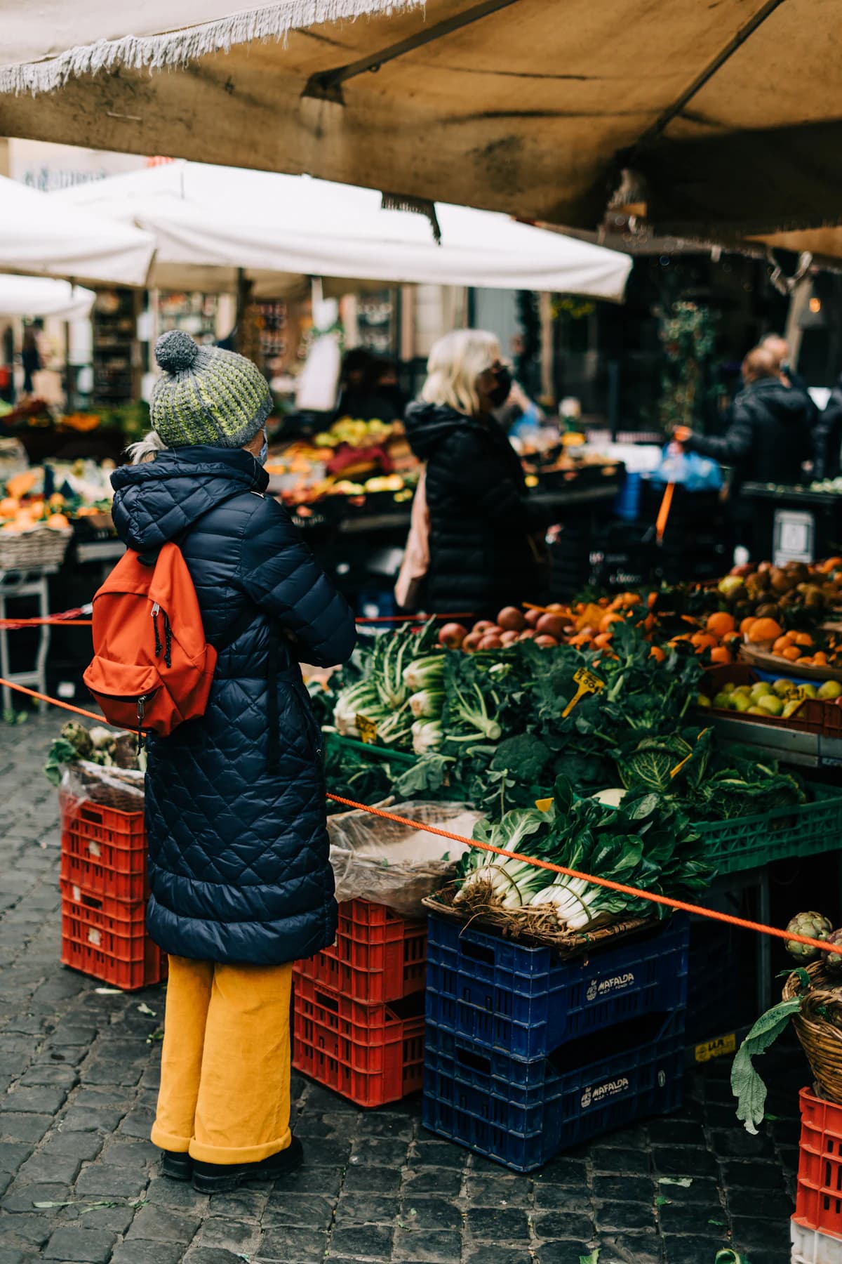 A produce stall at a covered market